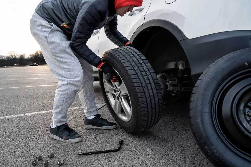 how to change a tire step by step essay