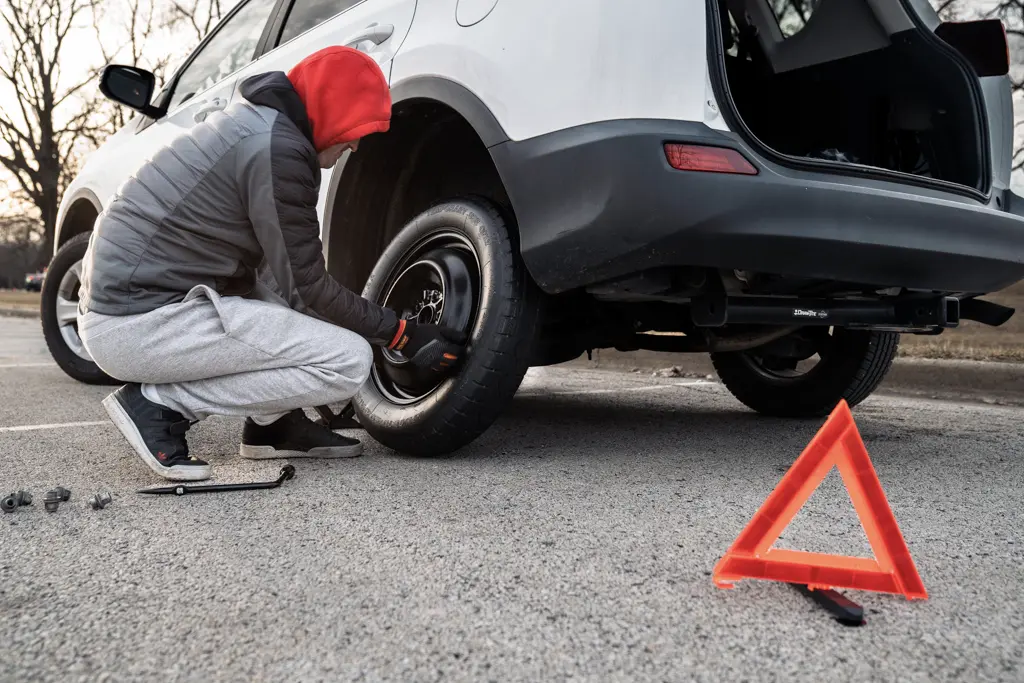 how to change a tire step by step essay