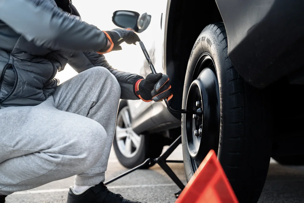 how to change a tire step by step essay
